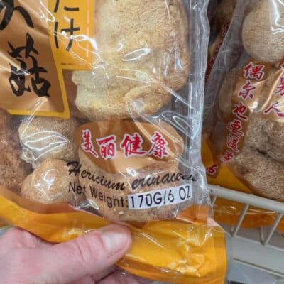 A bag of dried lions mane mushrooms for sale at a store.