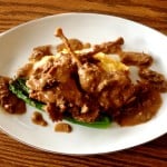 Braised Pheasant legs with morels and asparagus