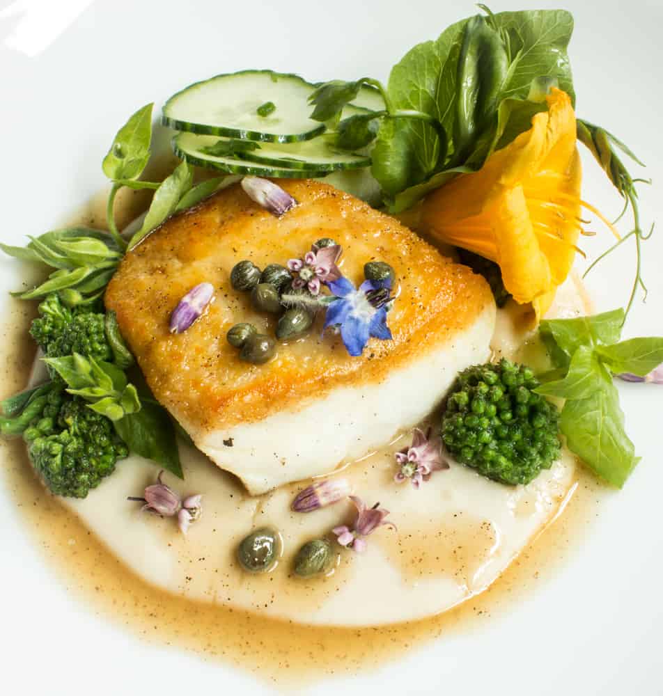 Halibut With White Bean Puree, Chickweed, Milkweed, and Flowers