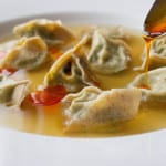 stinging nettle tortelli in lactarius broth