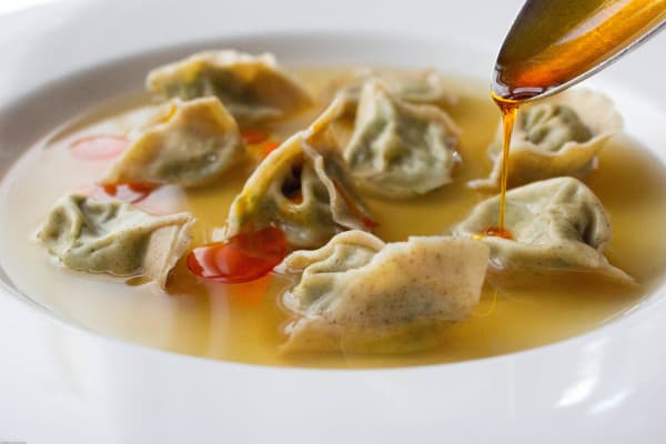 stinging nettle tortelli in lactarius broth