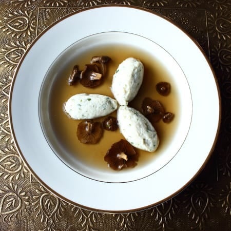 yellowfoot chanterelle consomme with northern pike mousseline dumplings