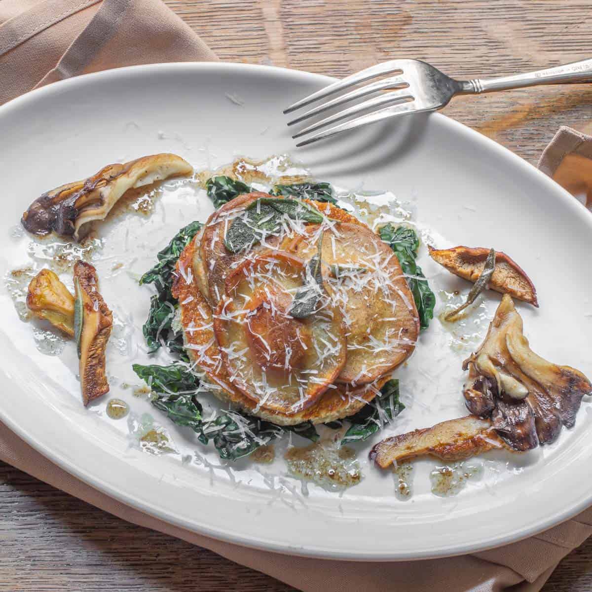 puffball mushroom ravioli with maitake, hygrophorus russula, and hedgehog mushrooms 