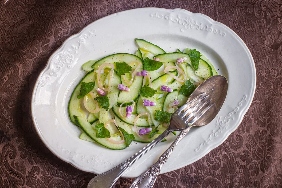 Cucumber salad with lemon balm and comfrey flowers