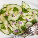 Cucumber salad with lemon balm and comfrey flowers_