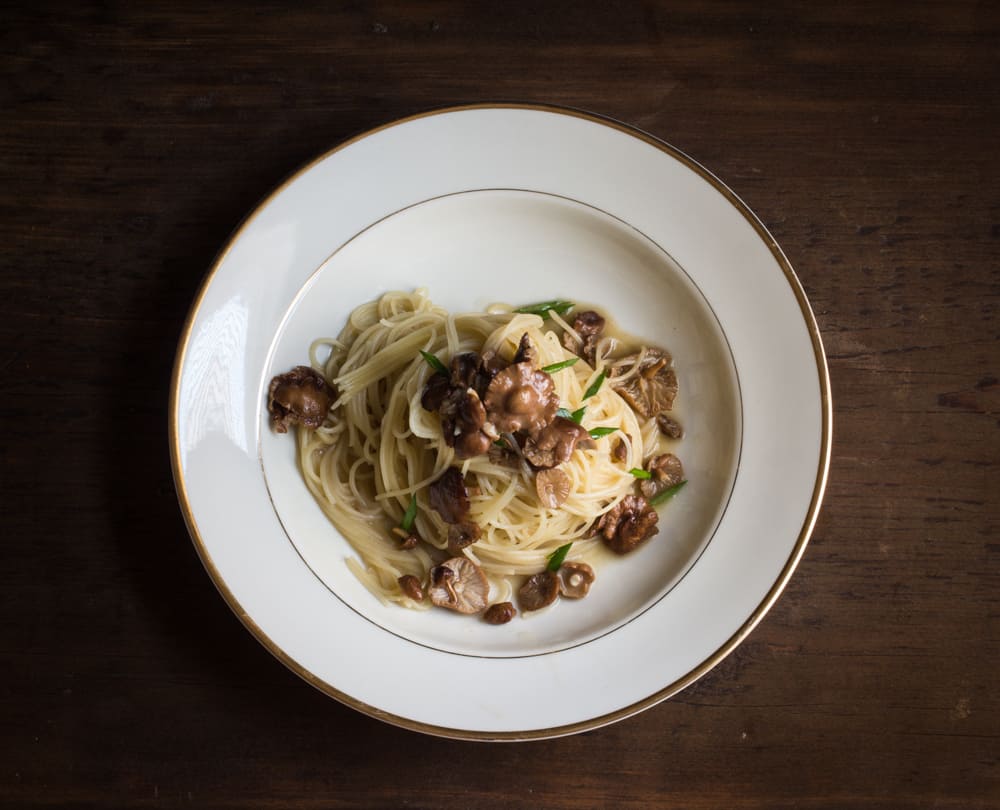 Angel hair pasta with fairy ring mushrooms and garlic chives