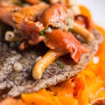 Buckwheat crusted sole with red chanterelle pan sauce and carrot ribbons