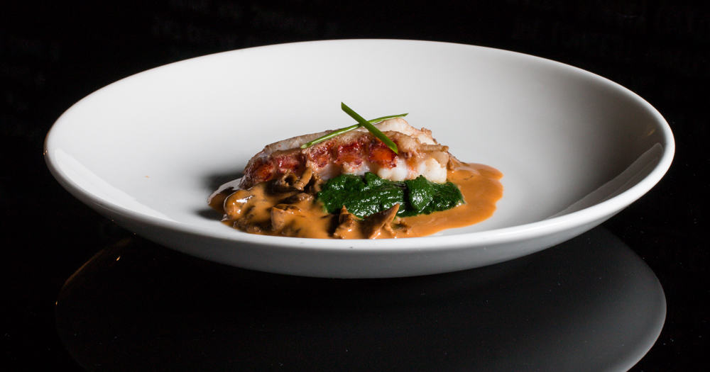 Sauteed lobster tail with yellowfoot chanterelles and dandelion-spinach puree