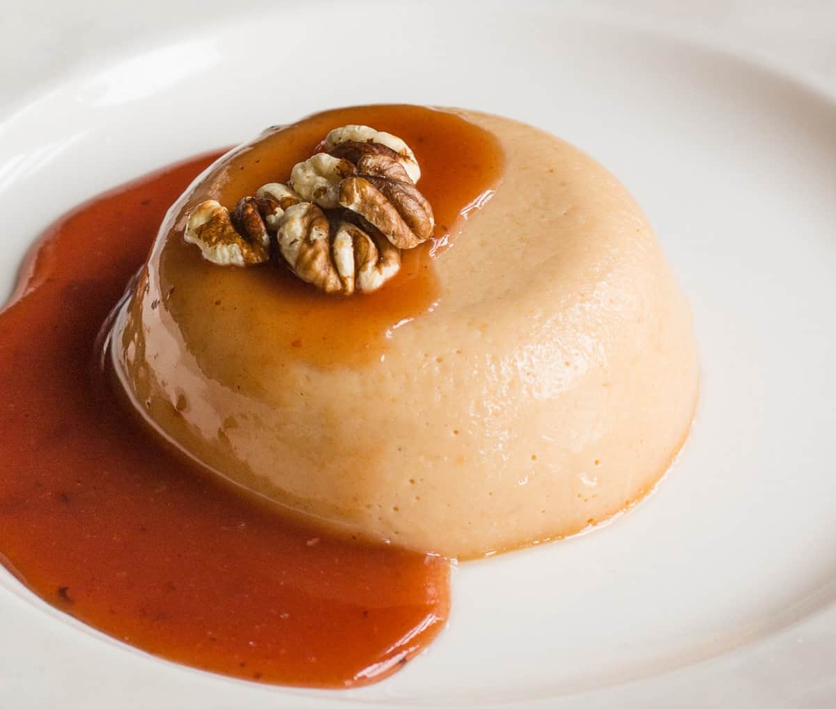 Paw Paw Panna Cotta Recipe with Wild Plum Sauce and hickory nuts