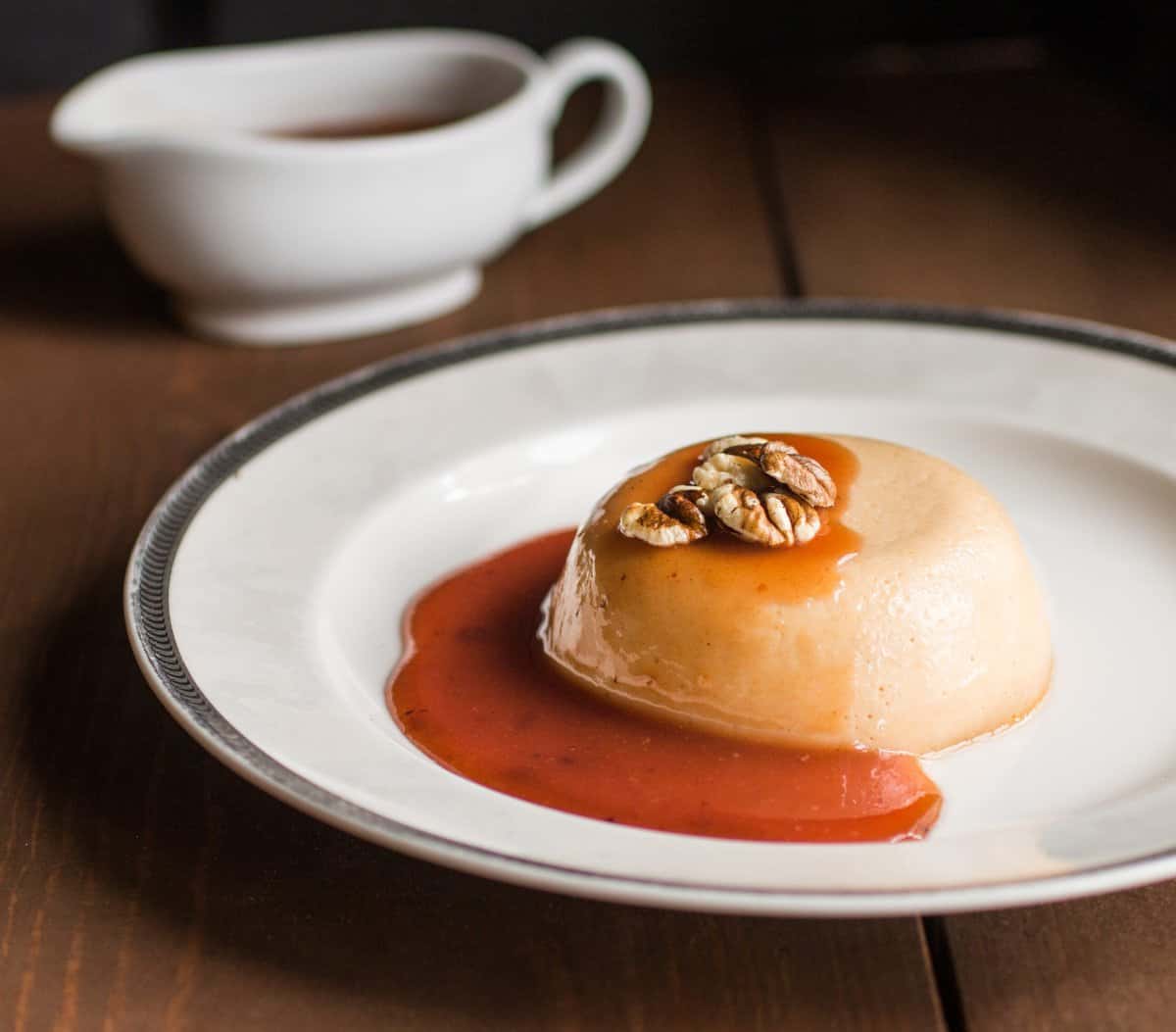 Paw Paw Panna Cotta with Wild Plum Sauce on a plate 