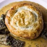 A recipe for a ricotta cheese and ramp tart with morel mushroom jus.