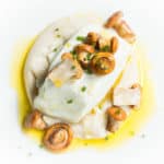 Braised Halibut with White Bean Puree Acorn Oil and Chanterelles