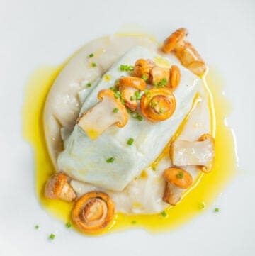 Braised Halibut with White Bean Puree Acorn Oil and Chanterelles