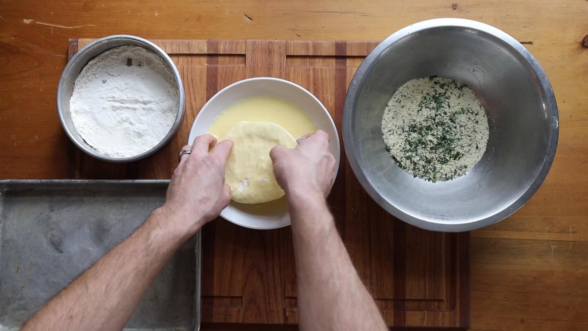 Breading a puffball mushroom 