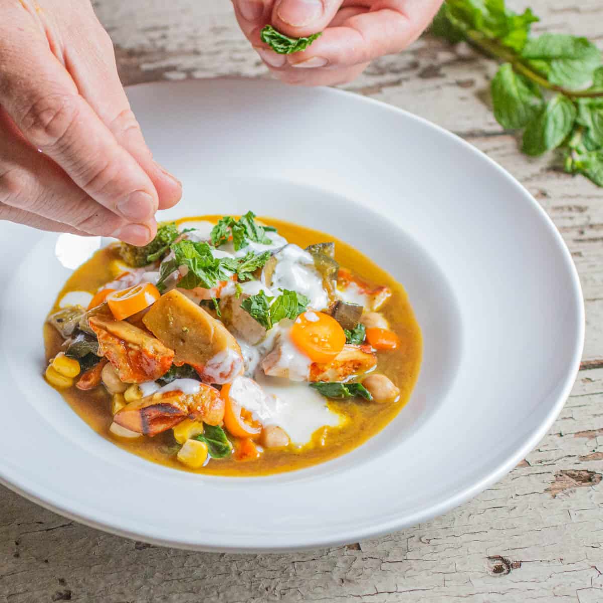 mushroom tagine in a bowl with yogurt