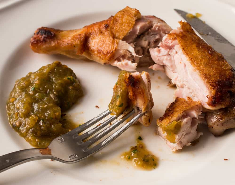 Chicken with green tomato-cow parsnip seed salsa verde