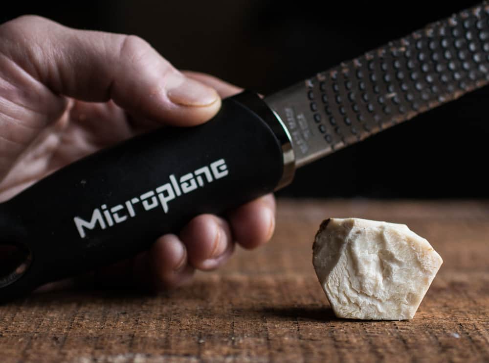 grating horseradish on a microplane 