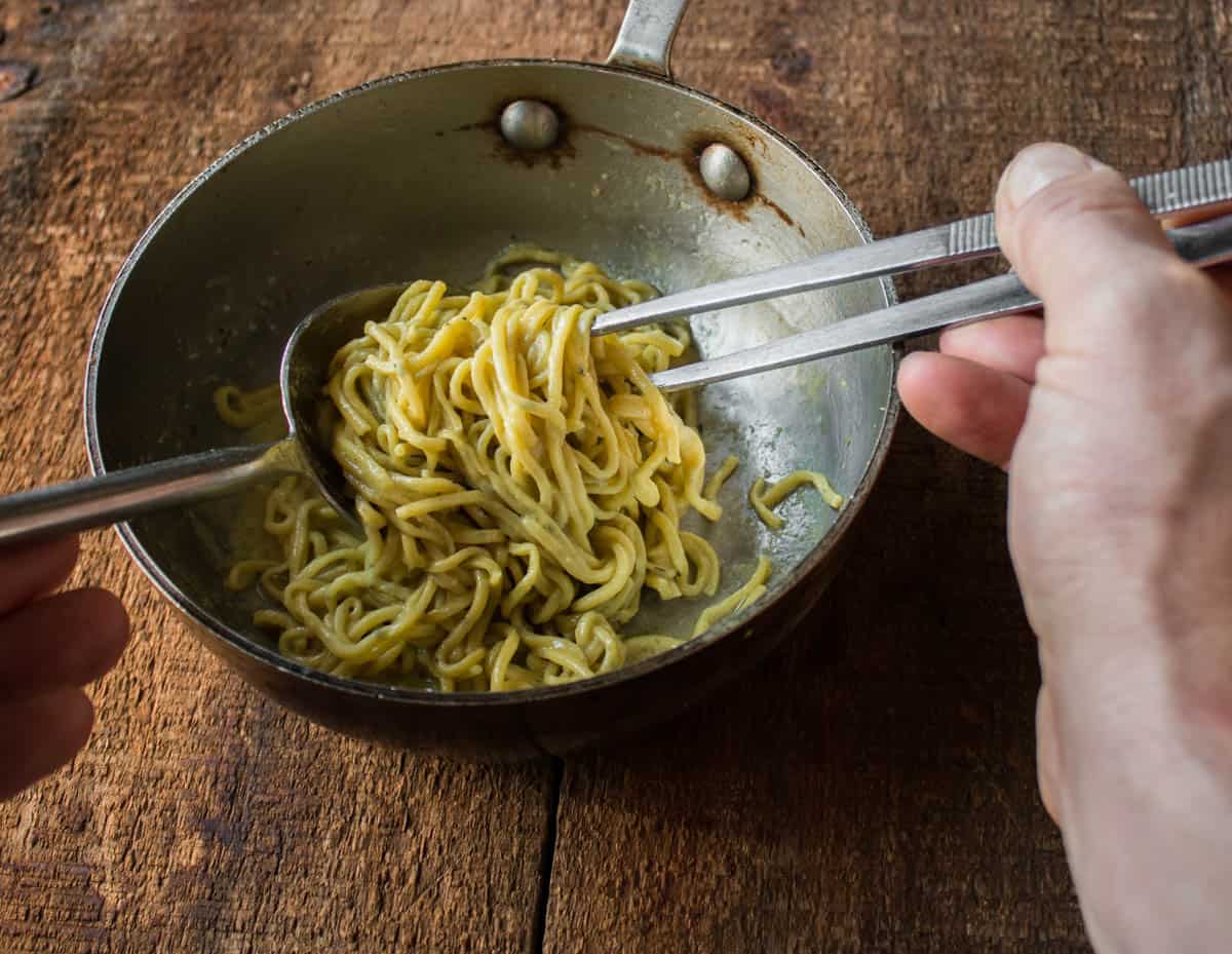 Plating duck egg pasta with cattail pollen