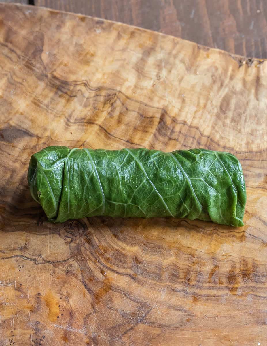 Roll the leaves into packets. If you want it to really stick, brush it with beaten egg white.