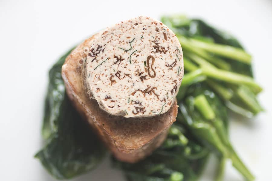 Pork tenderloin with morel mushroom butter and spinach