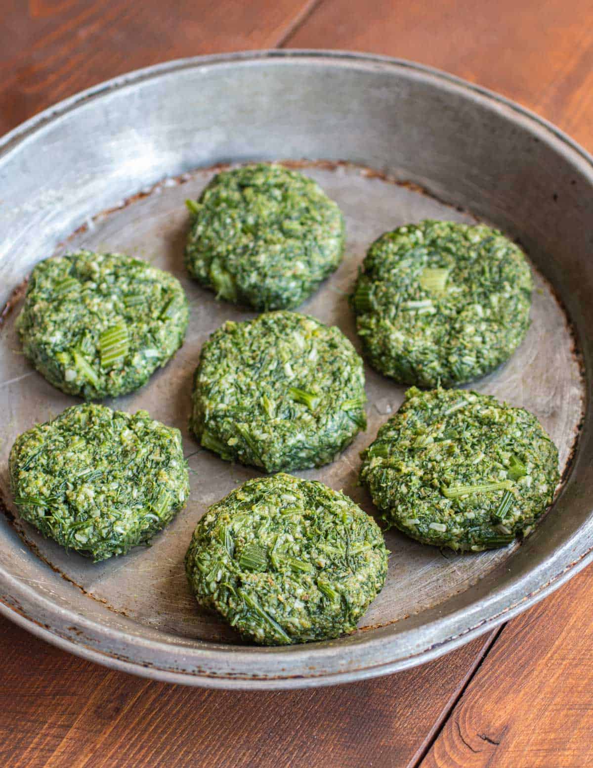 cakes made of cooked fennel stalks and greens 