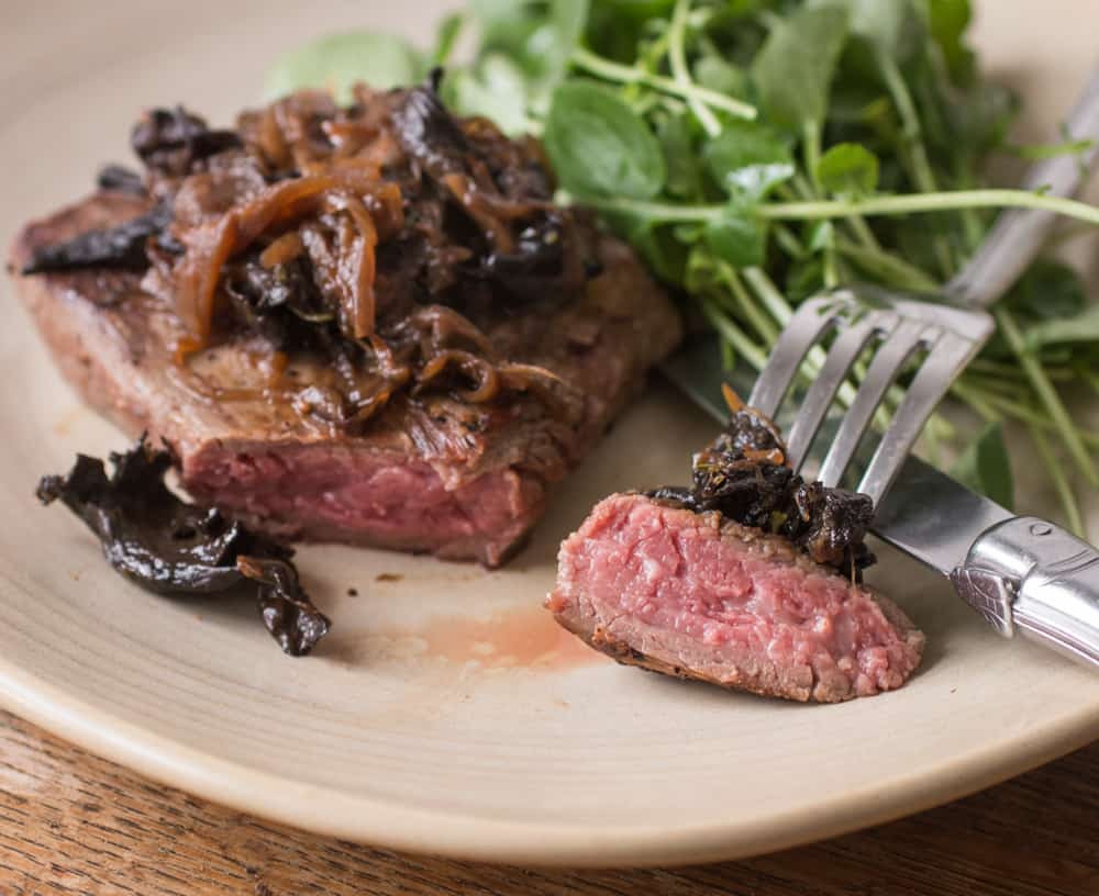 Flank Steak with caramelized shallots, black trumpet mushrooms and watercress (