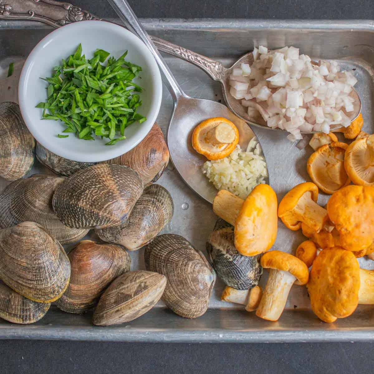 Ingredinets for linguine with white manilla clam sauce and chanterelle mushrooms