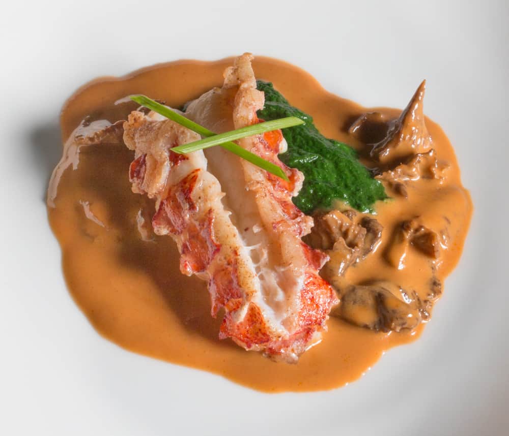 Lobster with yellowfoot chanterelles and spinach-dandelion puree