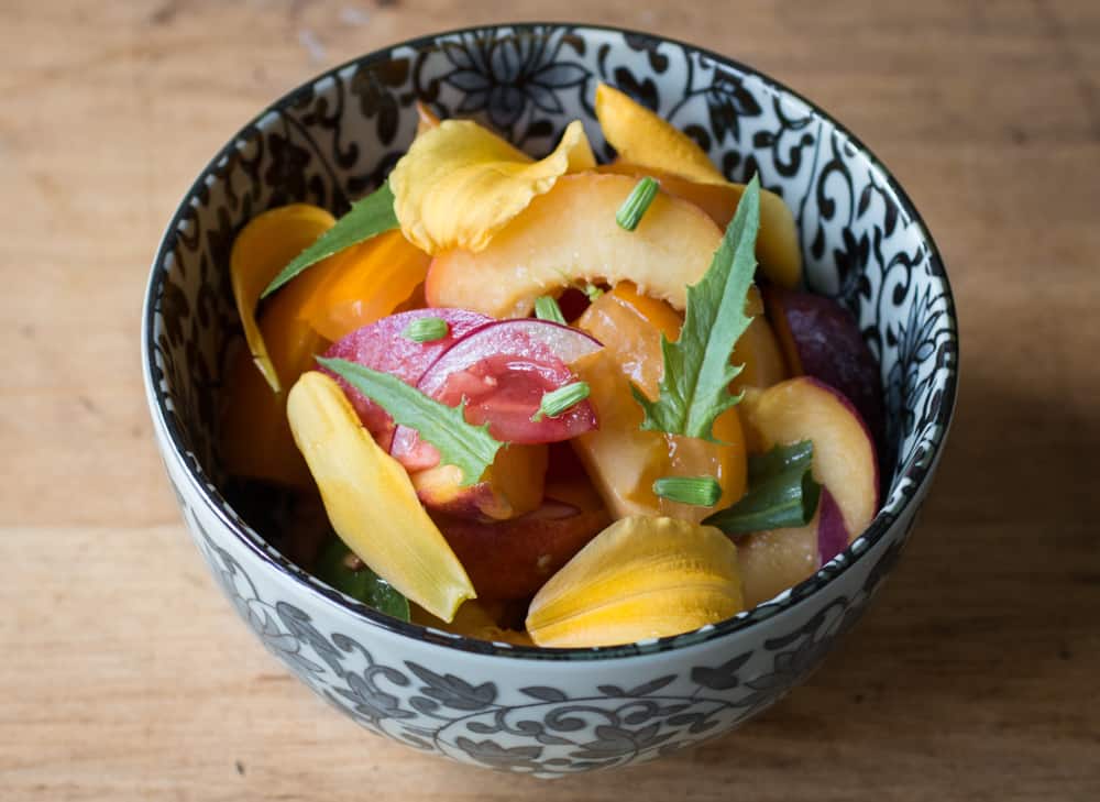 Tomato and peach salad with Erechtites hieraciifolius burnweed fireweed