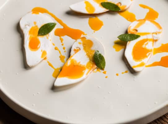 Raw matsutake mushrooms with acorn oil and kinome