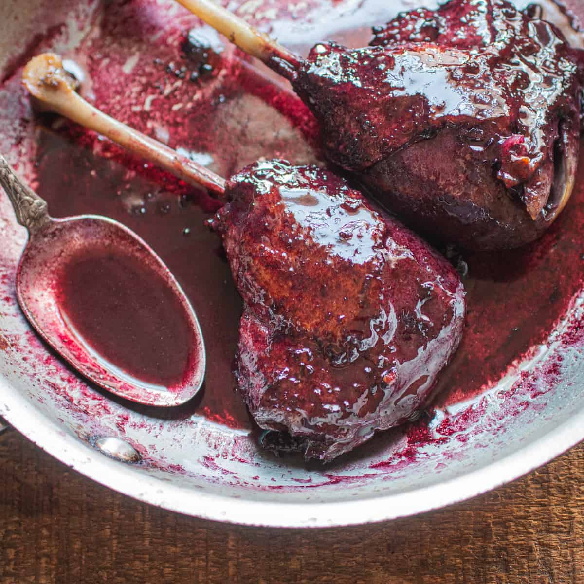 Wild goose leg confit glazed with wild grape reduction