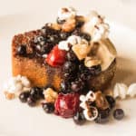 Caramelized pumpkin bread with wild plums, candied black walnuts, wild blueberries and heirloom popcorn