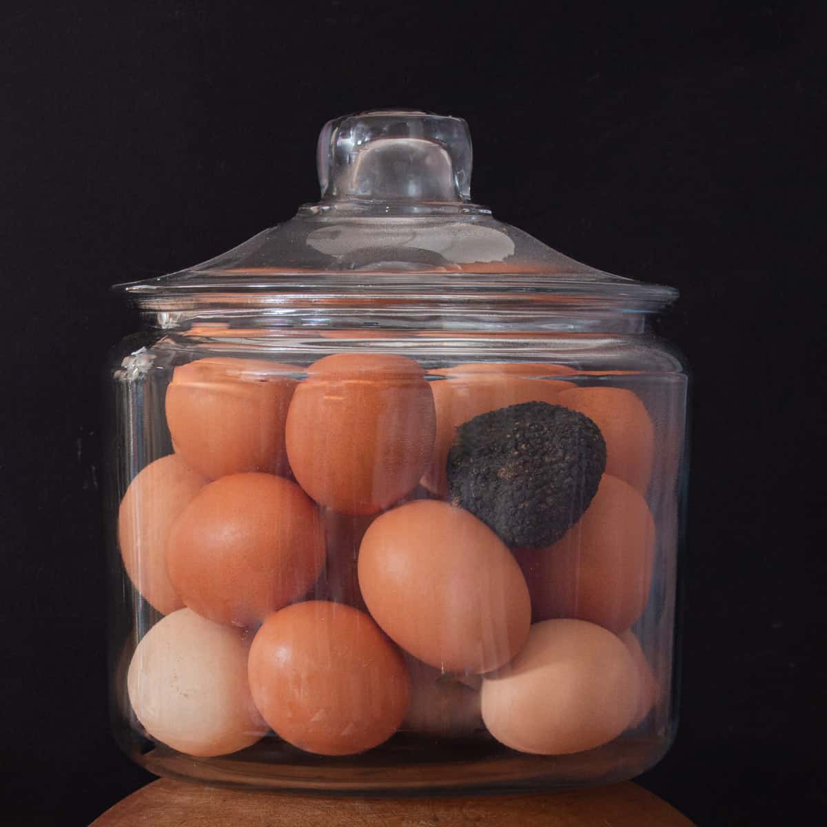 Storing truffles with eggs in a jar