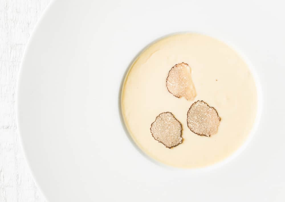 Black truffle and goat milk custard royale