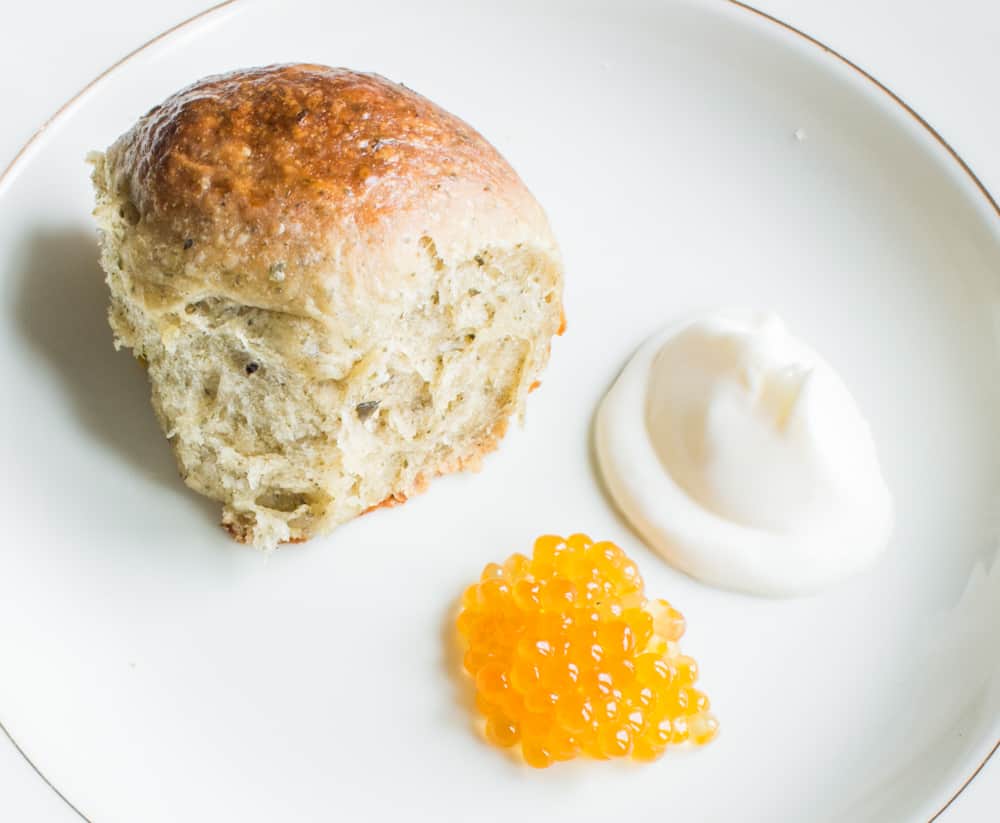 Wild herb brioche bun with creme fraiche and trout caviar 