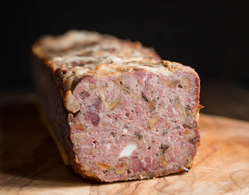 Turkey terrine with lobster mushrooms and venison bacon