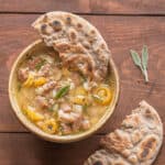 Goat stew with barrel cactus buds, sage, tepary beans, and wood ash hominy