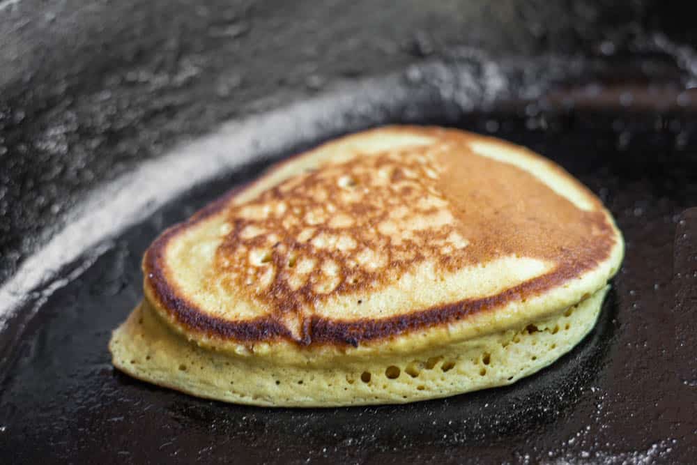 Close up image of cooking cattail pollen pancakes. 