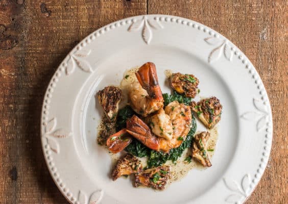 Seared prawns with coral or ramaria mushrooms, heirloom garlic butter sauce and lacinato kale
