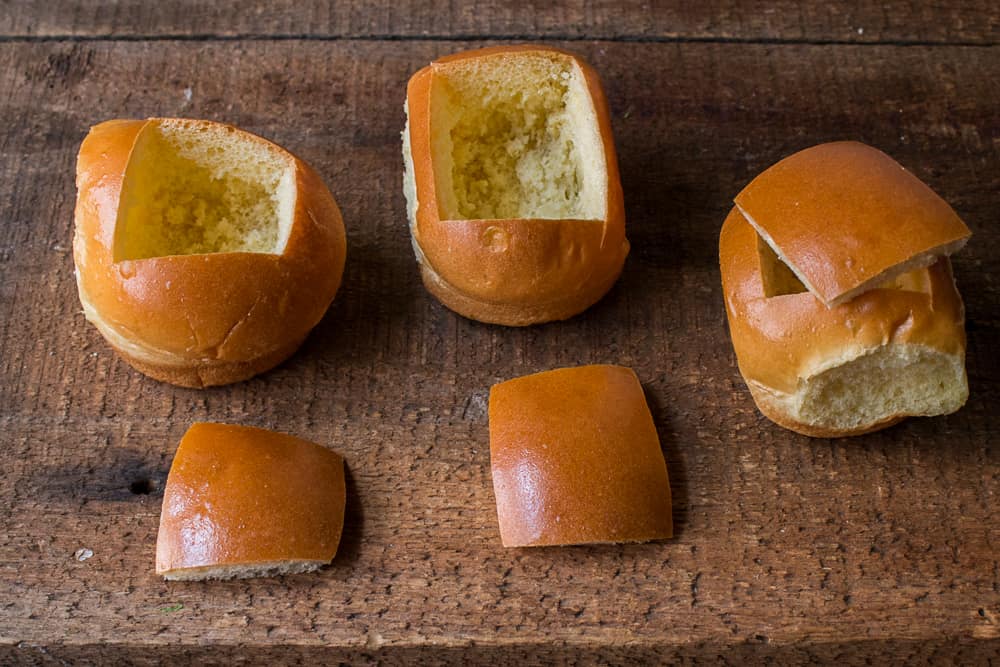 cutting the top off dinner rolls