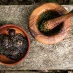 Stropharia or wine cap mushrooms cooked in embers with crushed parsley and garlic sauce