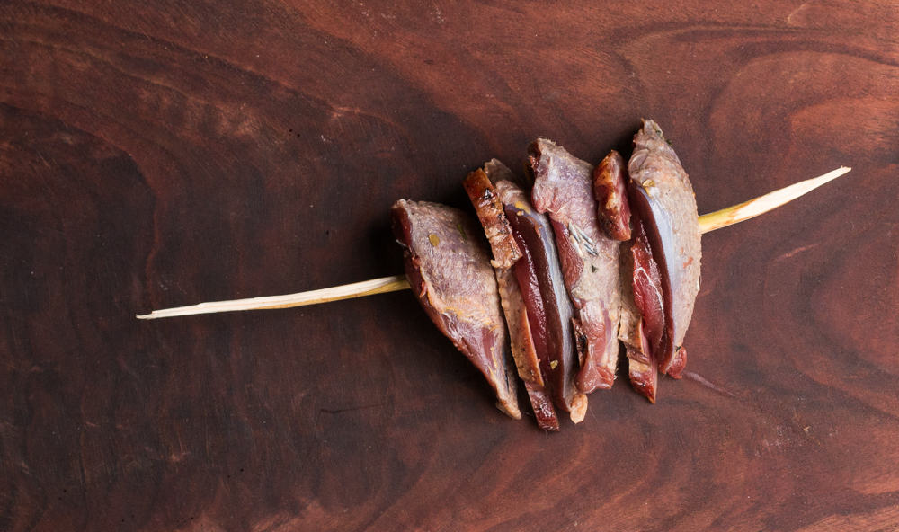 Pigeon and ram bacon brochette