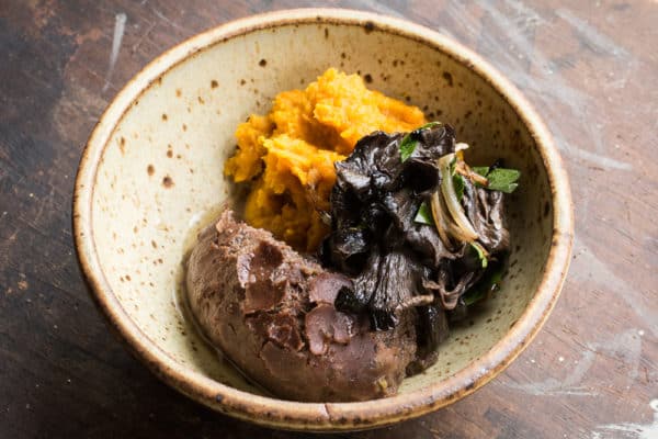 bread baked with rams blood, squash and black trumpet mushrooms