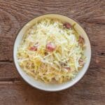 pan fried cabbage in a bowl with bacon