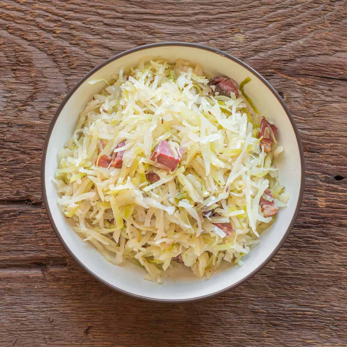pan fried cabbage in a bowl with bacon 