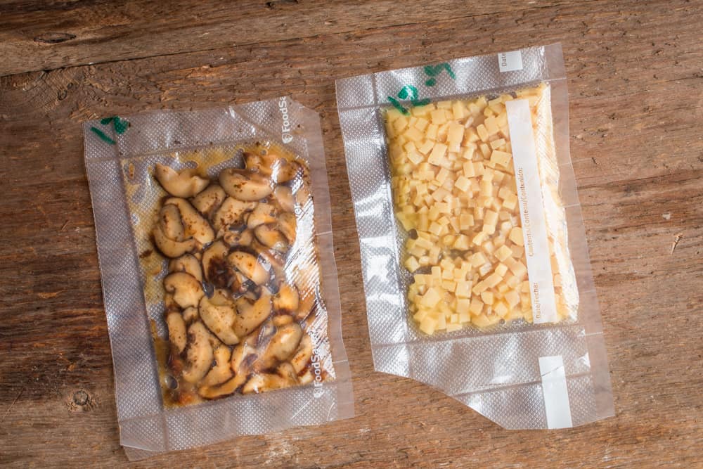 King oyster mushrooms and shiitakes fermenting in vacuum bags