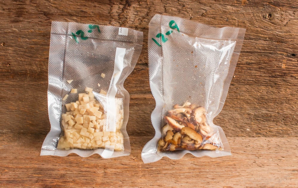 King oyster mushrooms and shiitakes fermenting in vacuum bags