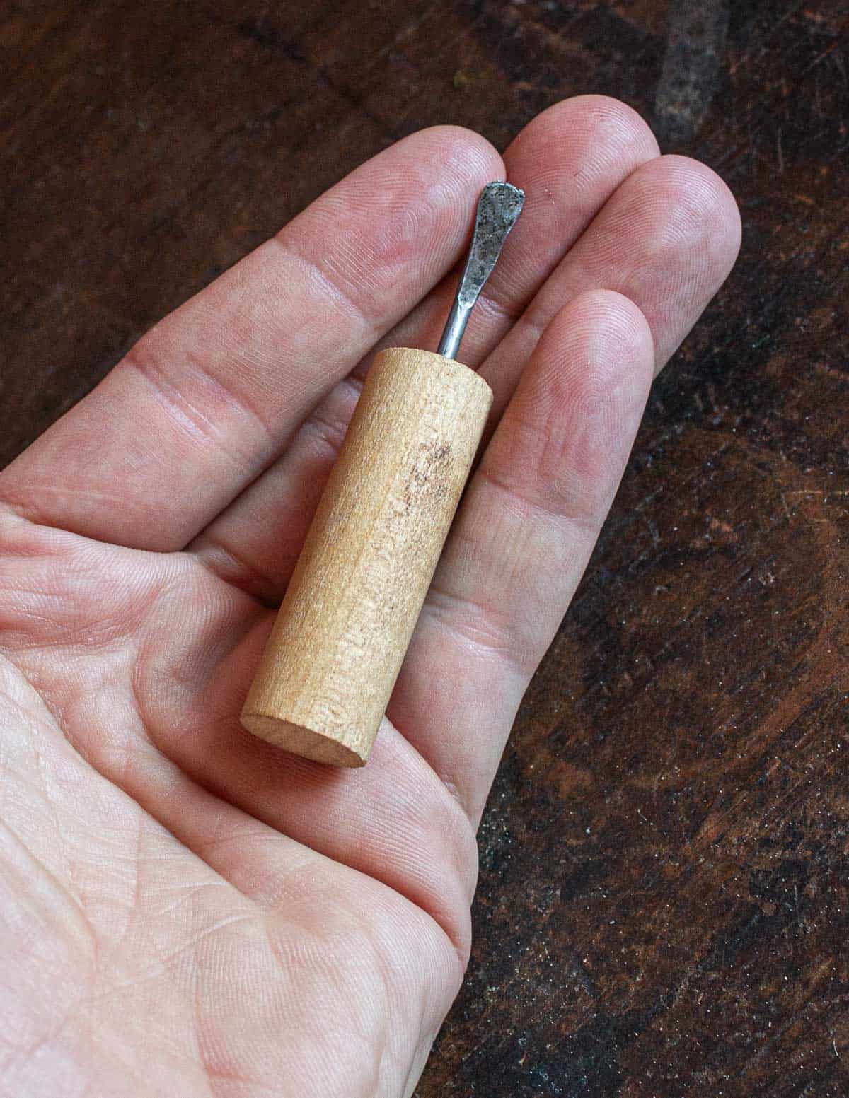 A homemade nut pick for black walnuts 