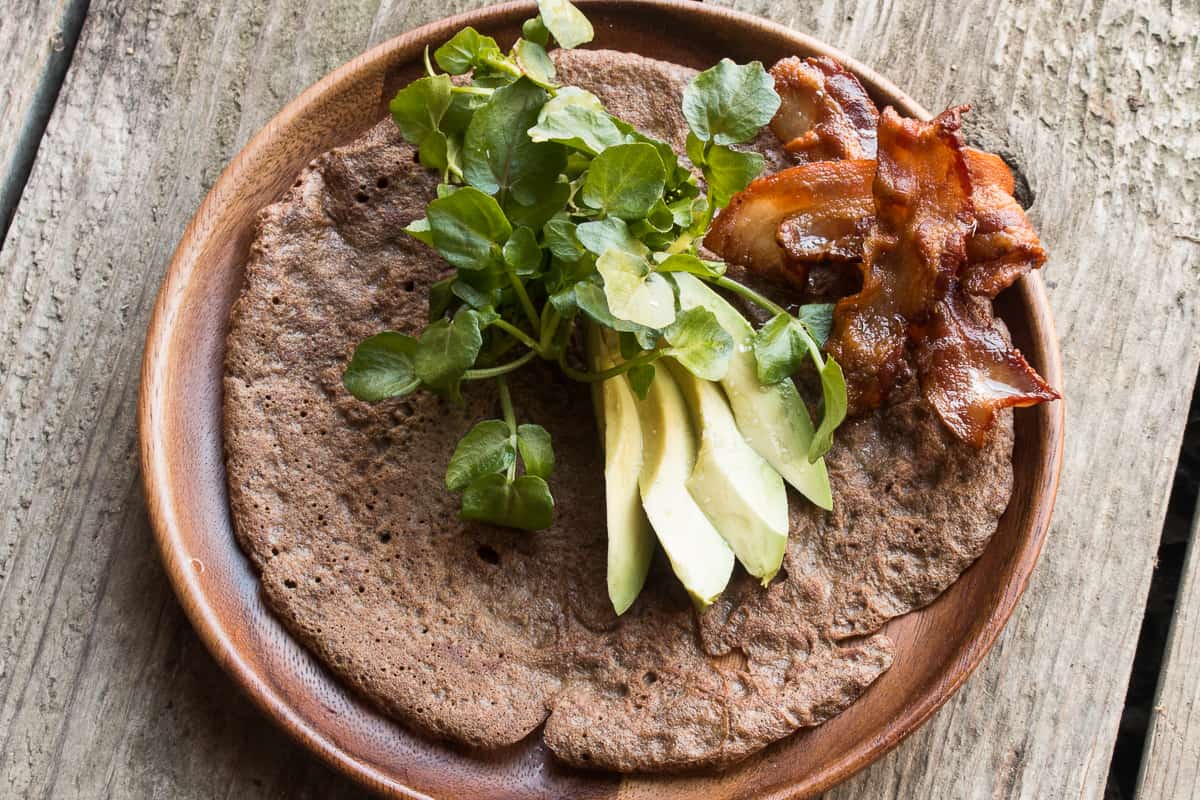 Acorn flour crepe with avocado, bacon and watercress