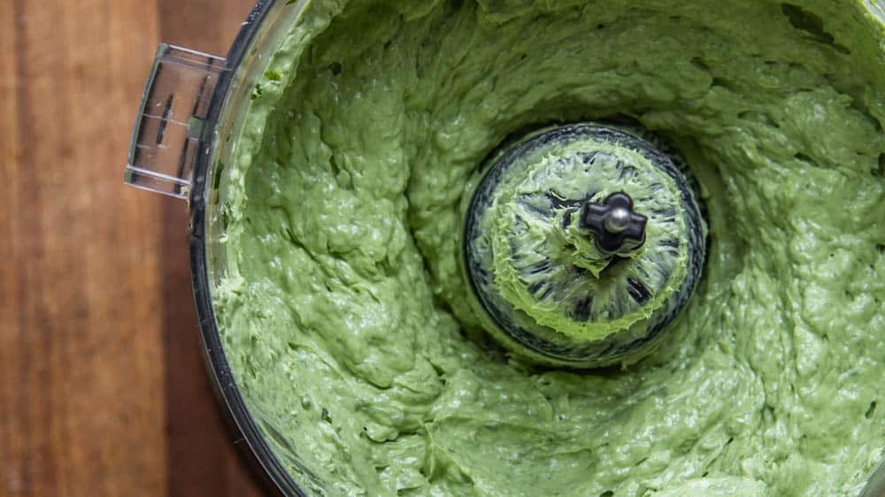 Ramp butter being pureed in a food processor.